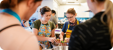 Volunteers helping cook meals at Ronald McDonald House of Southern Arizona